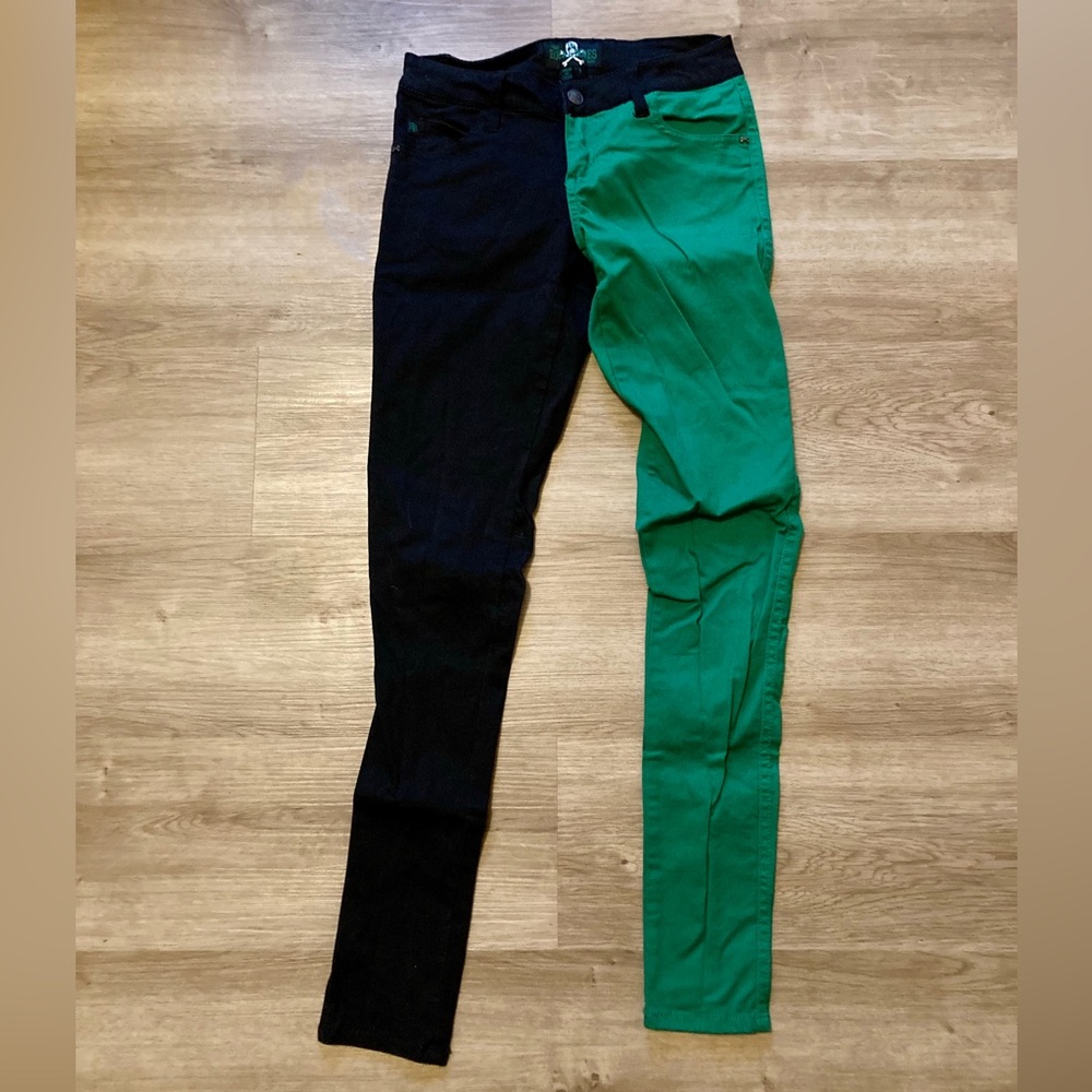 Half black and green jeans